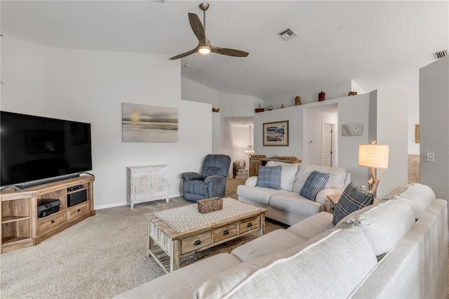 living room with ceiling fan, light colored carpet, and vaulted ceiling