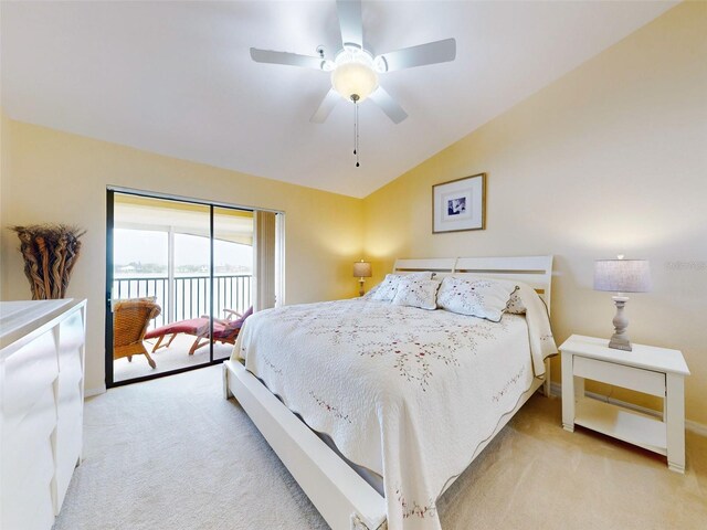 bedroom with access to outside, light colored carpet, lofted ceiling, and ceiling fan