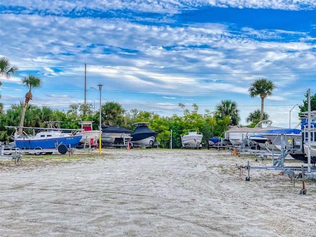 452 Bouchelle Dr Unit 303, New Smyrna Beach, FL 32169 - view of uncovered parking lot