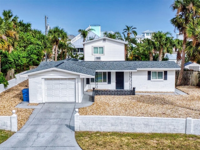 view of front property with a garage