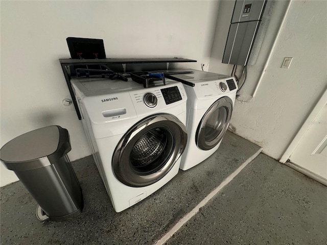 laundry area featuring independent washer and dryer and electric panel