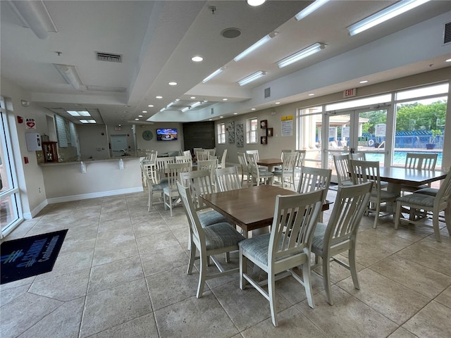 dining room with visible vents, recessed lighting, french doors, and baseboards