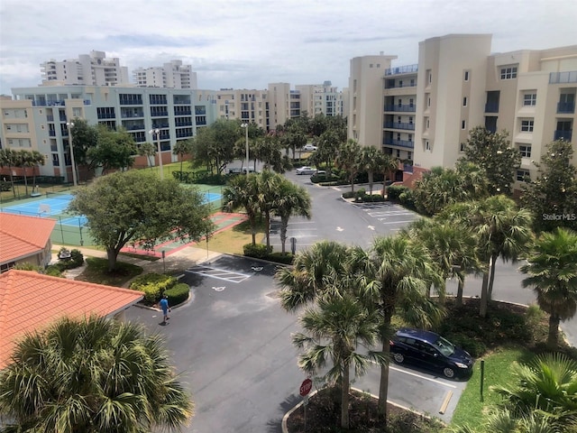 birds eye view of property featuring a view of city