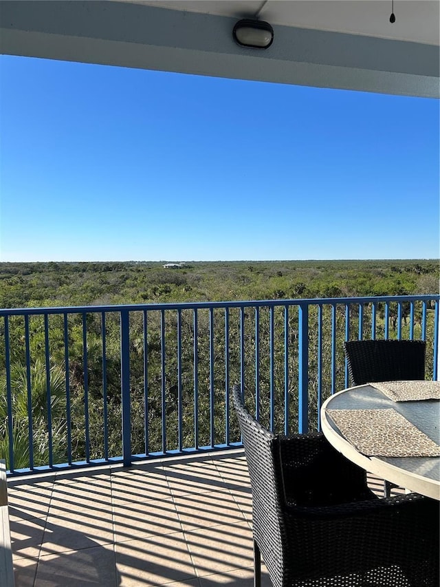 balcony featuring outdoor dining area