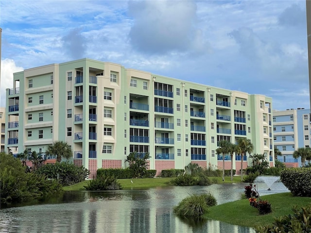 view of property with a water view