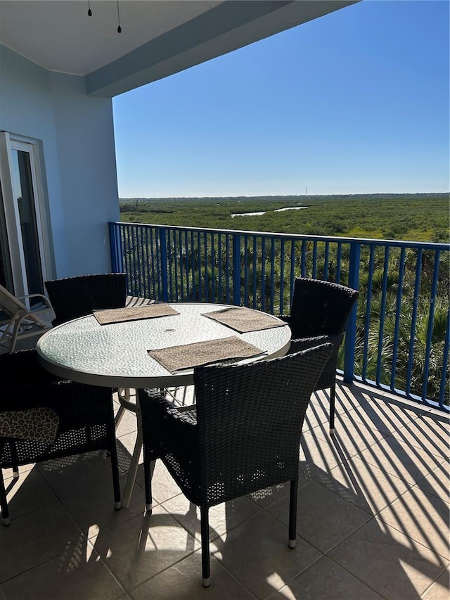 balcony featuring outdoor dining area