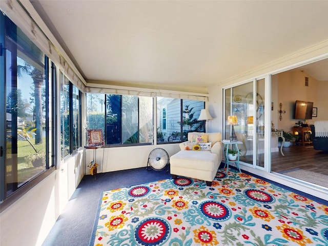 sunroom featuring a wealth of natural light