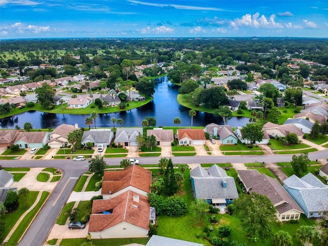 drone / aerial view with a water view