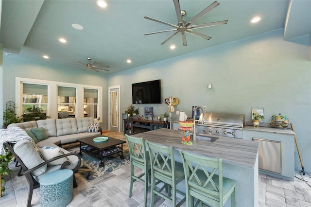 living room featuring ceiling fan