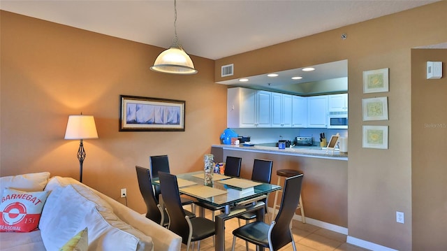 view of tiled dining area