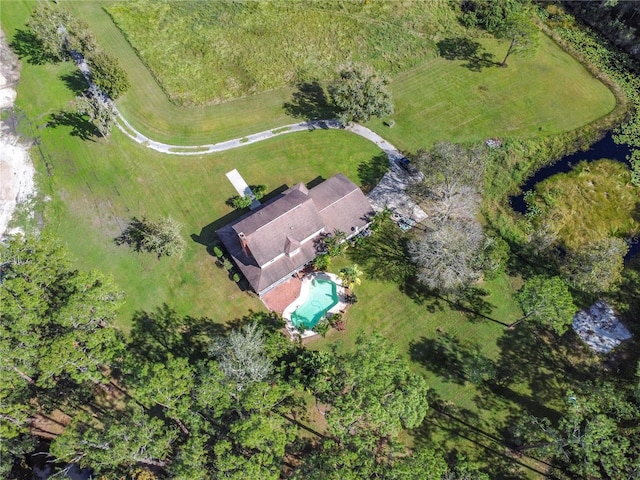 birds eye view of property with a rural view