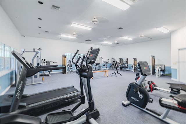 workout area with ceiling fan