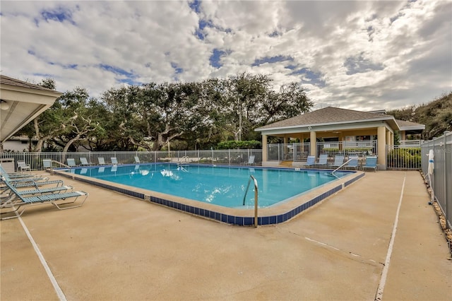 view of pool featuring a patio area