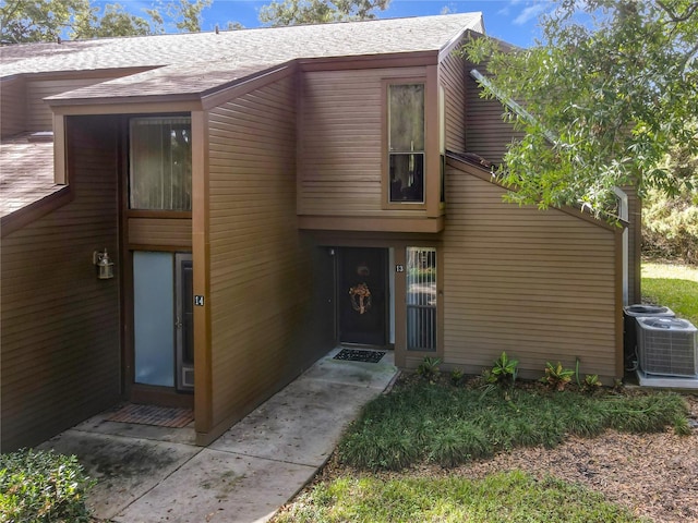 view of front of home with central air condition unit