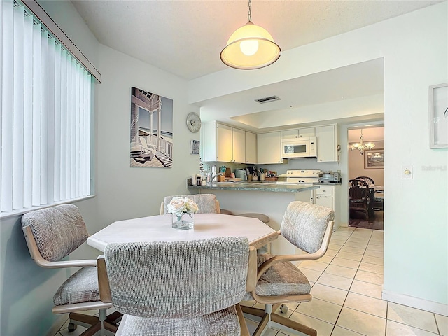 view of tiled dining space