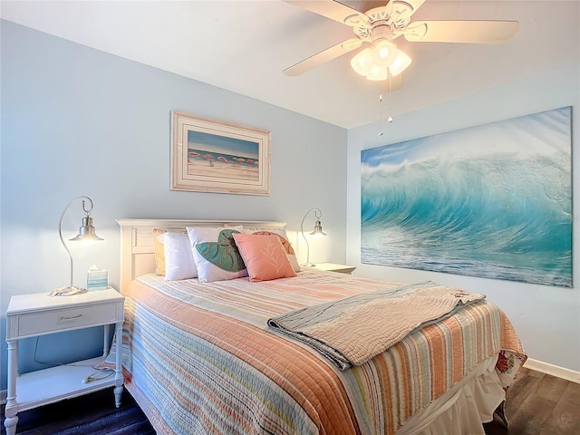 bedroom with dark wood-type flooring and ceiling fan