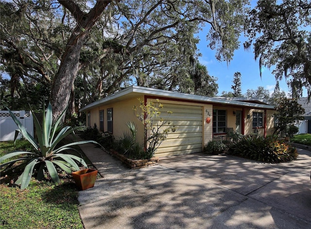 ranch-style home with a garage