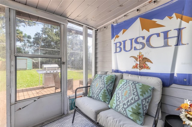 sunroom / solarium with wooden ceiling