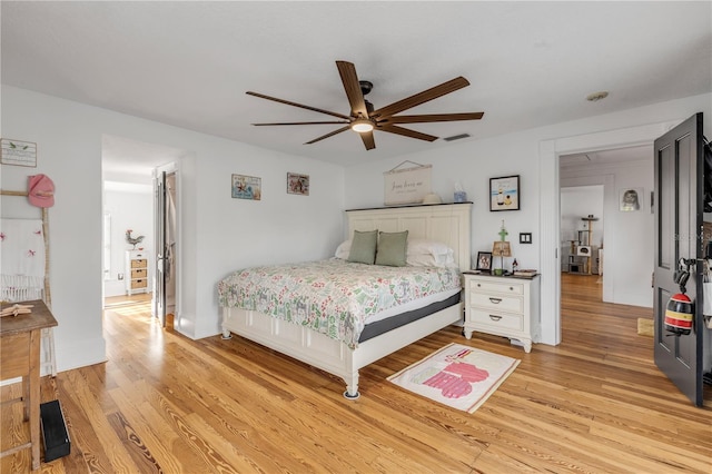 bedroom featuring ceiling fan and light hardwood / wood-style flooring