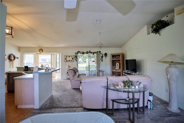 living room with lofted ceiling, hardwood / wood-style floors, and ceiling fan