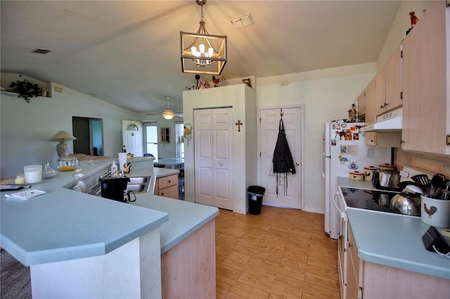 kitchen featuring decorative light fixtures, light brown cabinetry, vaulted ceiling, sink, and kitchen peninsula