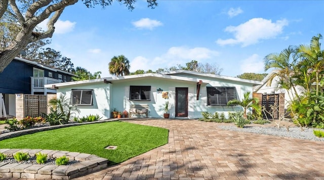 view of front of house with a front yard
