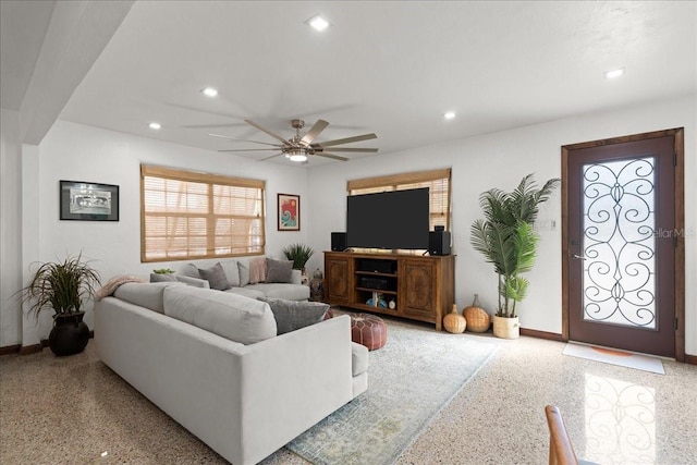 living room with ceiling fan