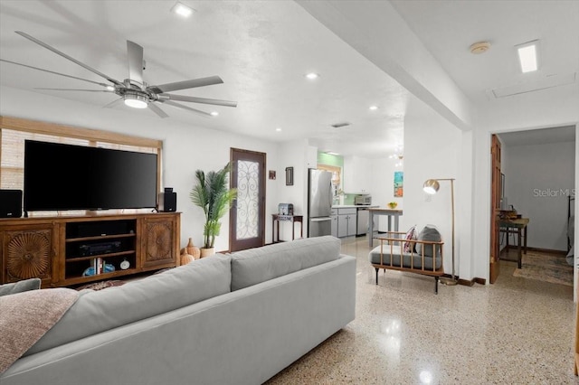 living room featuring ceiling fan