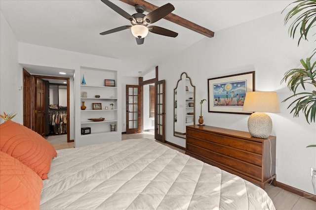 bedroom featuring french doors, vaulted ceiling with beams, a closet, and ceiling fan