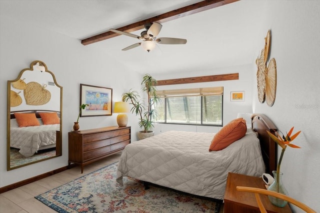 tiled bedroom featuring vaulted ceiling with beams and ceiling fan