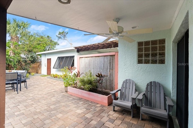 view of patio / terrace with ceiling fan