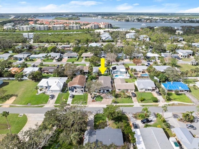 drone / aerial view featuring a water view