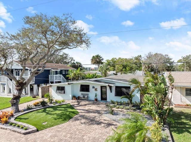 view of front of home with a front yard