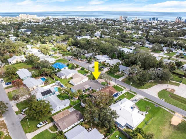 drone / aerial view with a water view