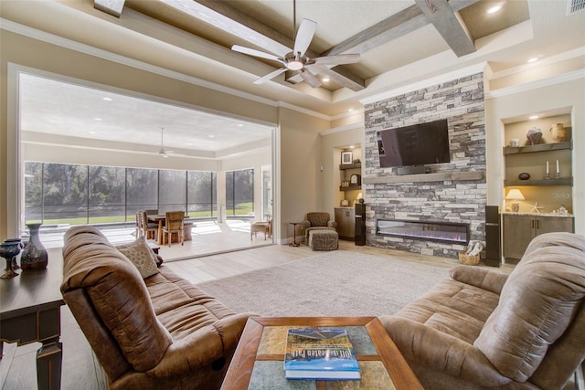 living room with hardwood / wood-style floors, beamed ceiling, crown molding, and coffered ceiling