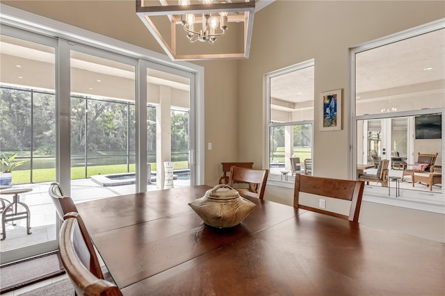 interior space featuring a chandelier and vaulted ceiling