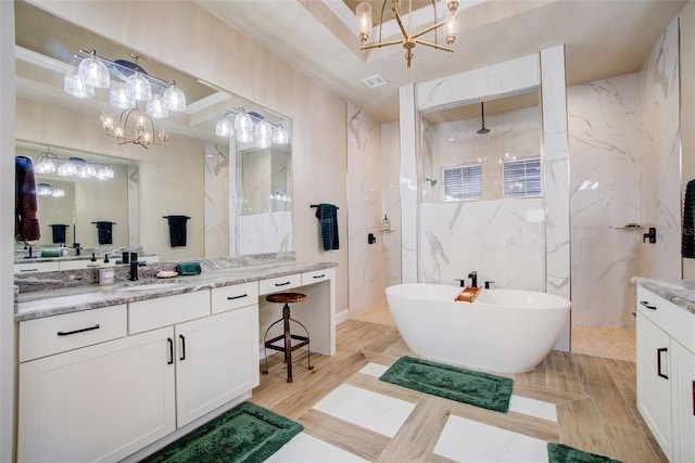 bathroom with tile walls, vanity, hardwood / wood-style flooring, and separate shower and tub