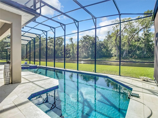 view of pool featuring a lawn, a lanai, a water view, and a patio area