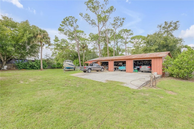 view of yard with a carport