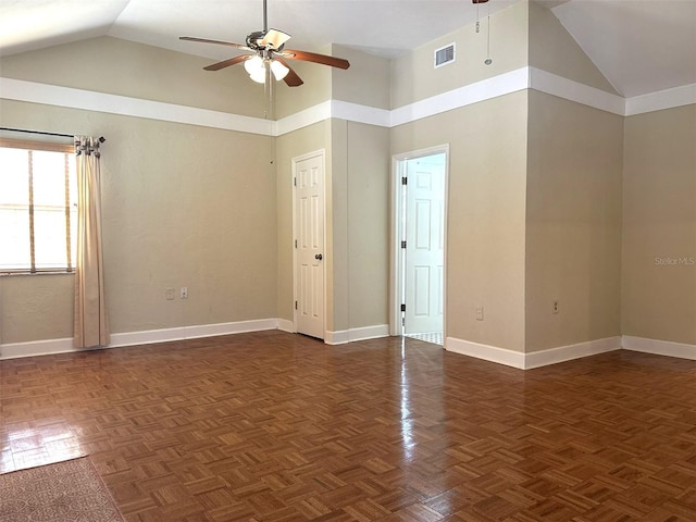 unfurnished room featuring ceiling fan, high vaulted ceiling, and dark parquet floors