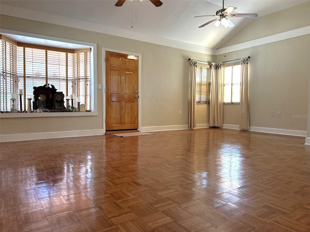 unfurnished room with ceiling fan, lofted ceiling, and dark parquet flooring