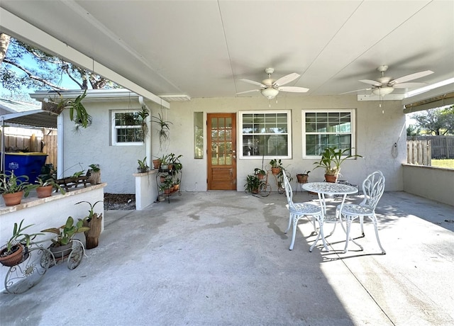 view of patio / terrace featuring ceiling fan