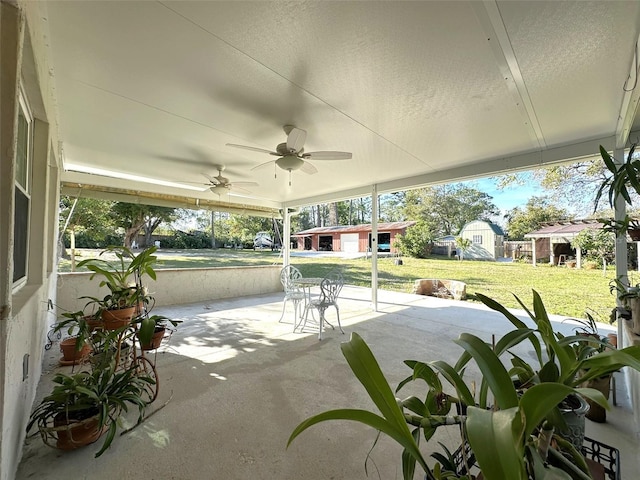 view of patio / terrace featuring ceiling fan