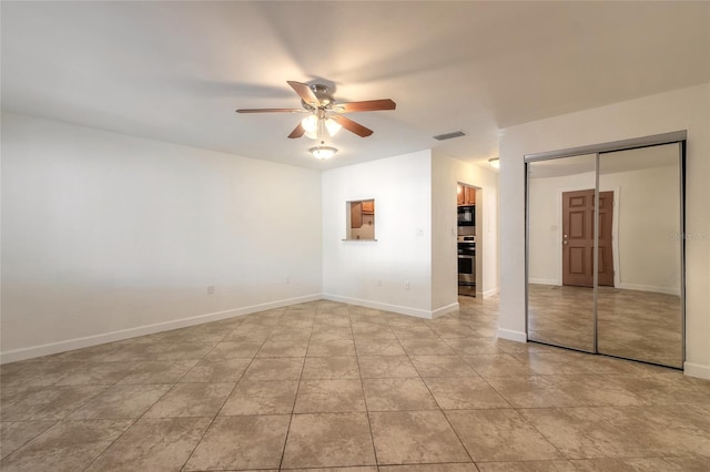 empty room with ceiling fan