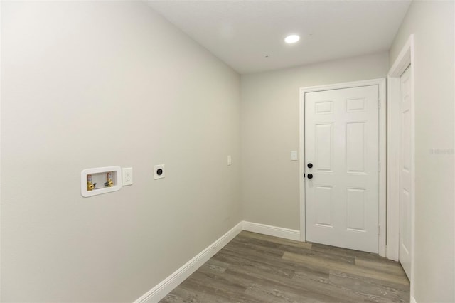 laundry area featuring hardwood / wood-style flooring, hookup for a washing machine, and hookup for an electric dryer