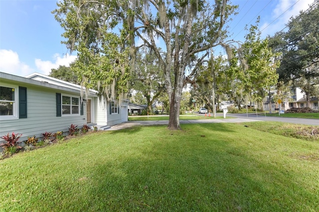 view of yard featuring a carport