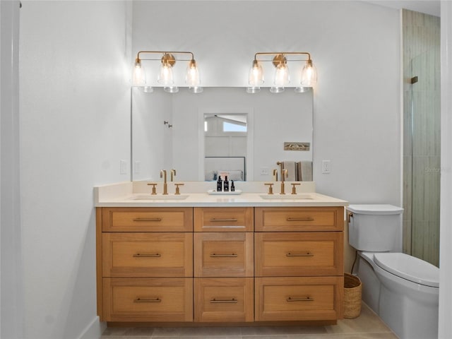 bathroom with toilet, tile patterned flooring, walk in shower, and vanity