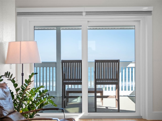 entryway with a water view