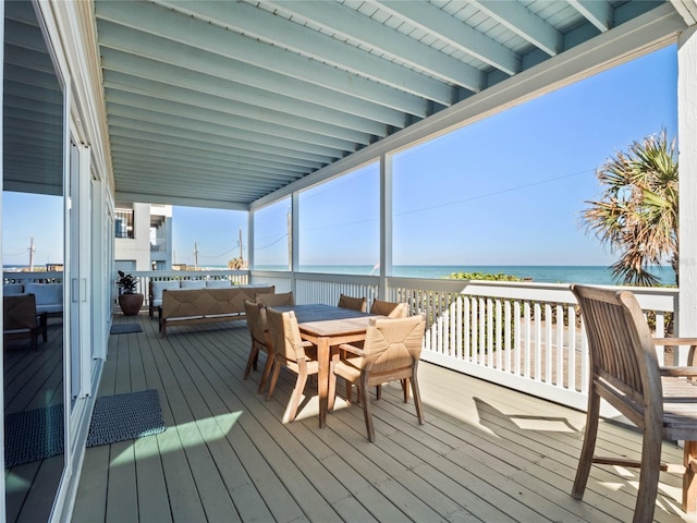 wooden terrace with a water view