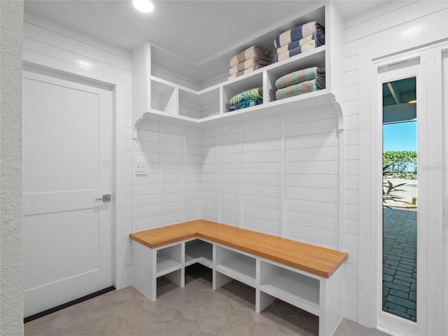 mudroom with light tile patterned flooring